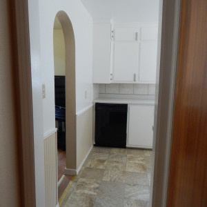 An arched doorway to provide more space